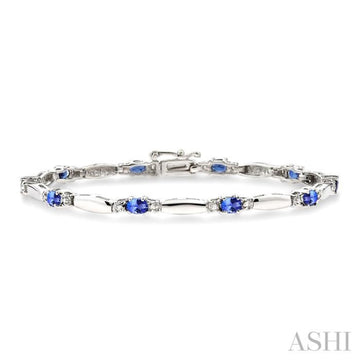 5x3 MM Oval Cut Tanzanite and 1/10 Ctw Bar and Oval Mount Round Cut Diamond Precious Bracelet in 10K White Gold